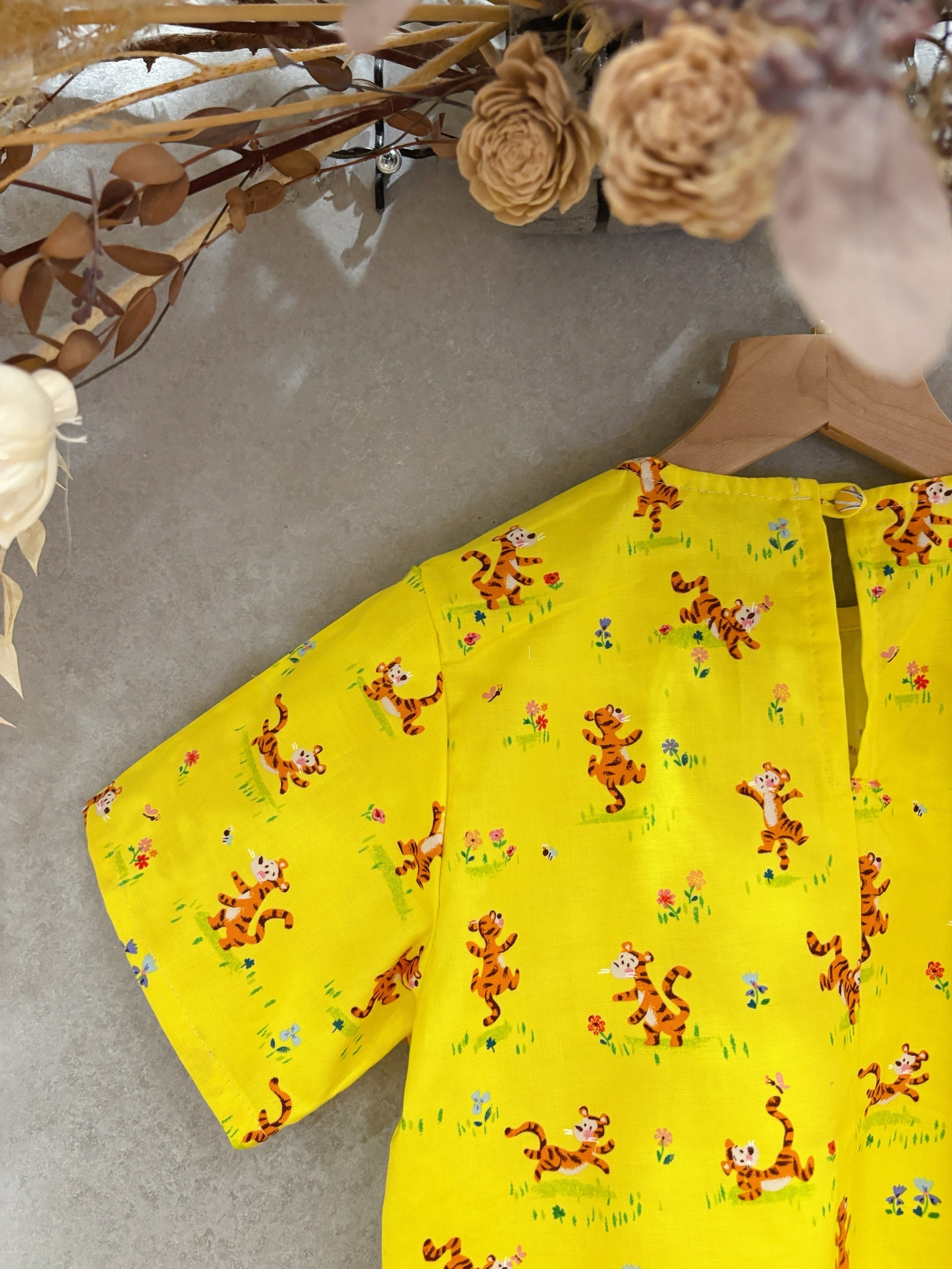 黃跳跳虎 口袋短袖上衣（110）