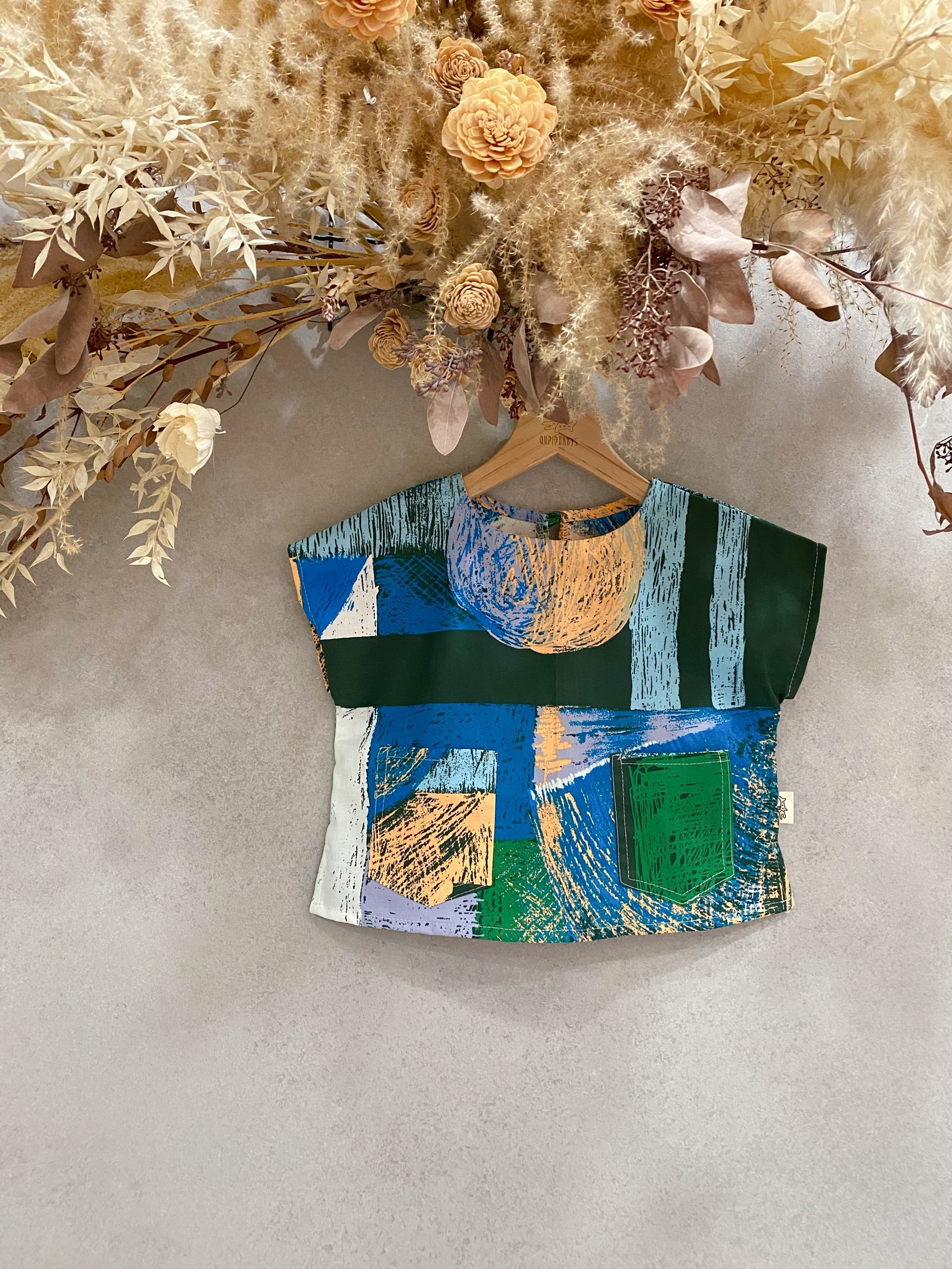 吉本藍橘刷色 落肩上衣（100）