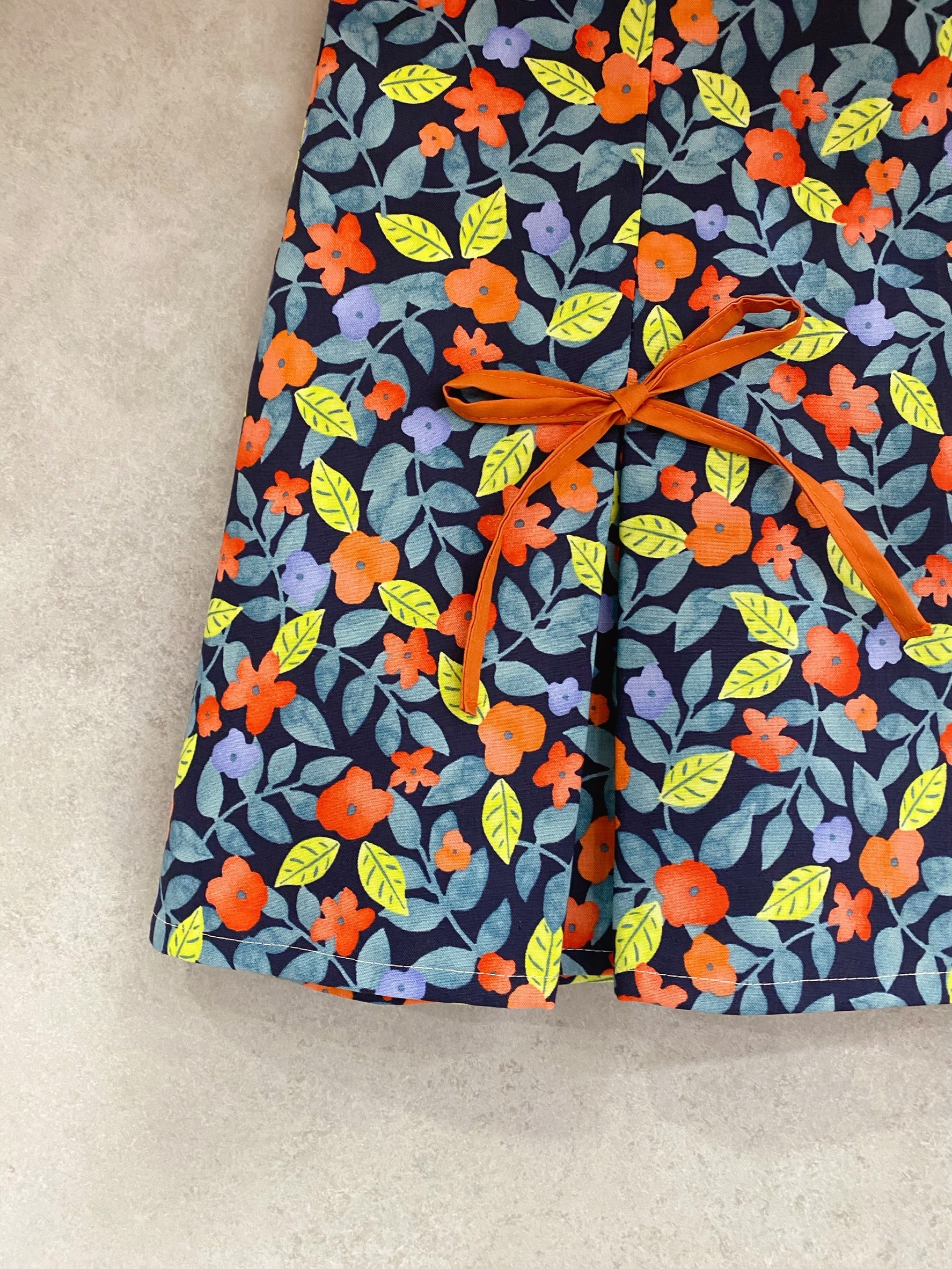 紅花綠葉 媽咪蝴蝶結連褲短裙（M）