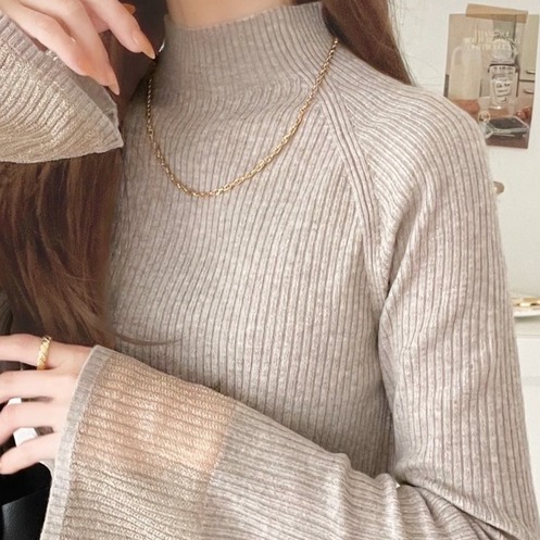 日本 透膚袖拼接針織上衣