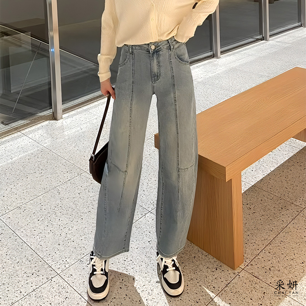 復古水洗分割線條牛仔彎刀長褲