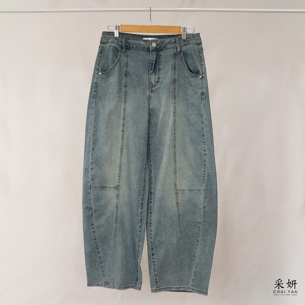 復古水洗分割線條牛仔彎刀長褲