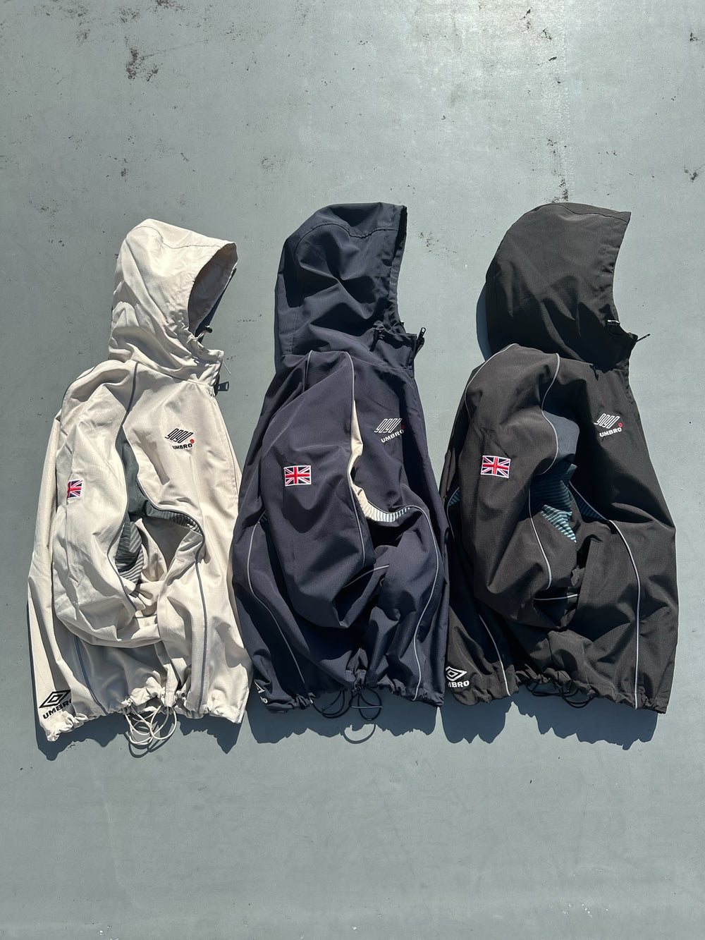 2025AW 9090 × umbro Gradation Nylon Hooded Jascket 聯名 尼龍 連帽 外套 現貨 NN2121