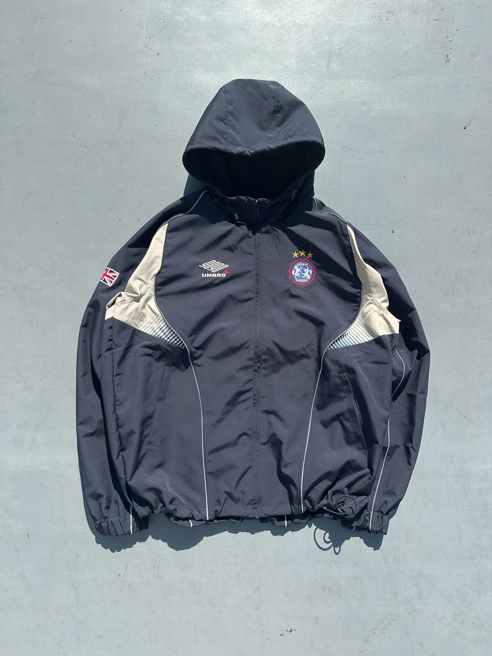 2025AW 9090 × umbro Gradation Nylon Hooded Jascket 聯名