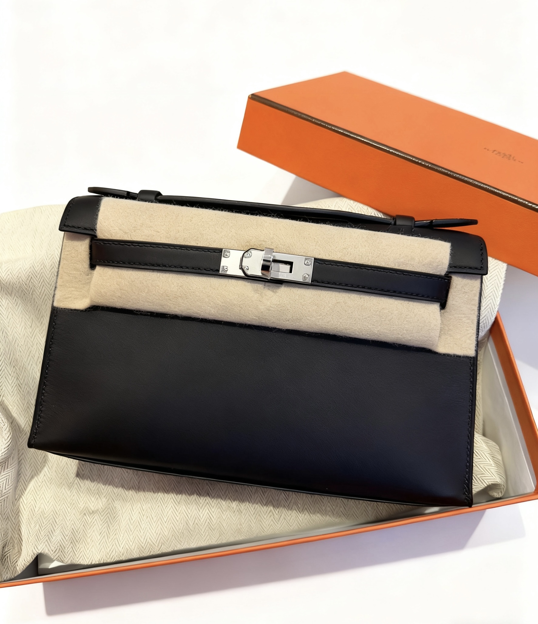 Kelly pochette 89 noir ck swift K