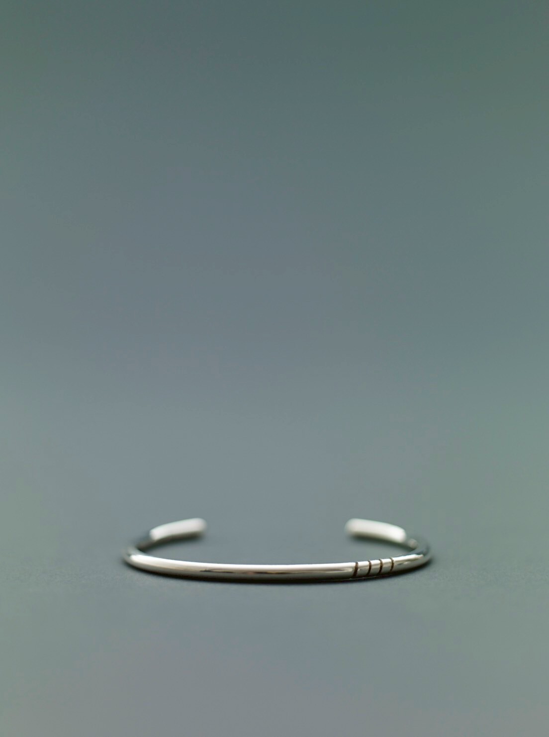 ACE four spiral bangle