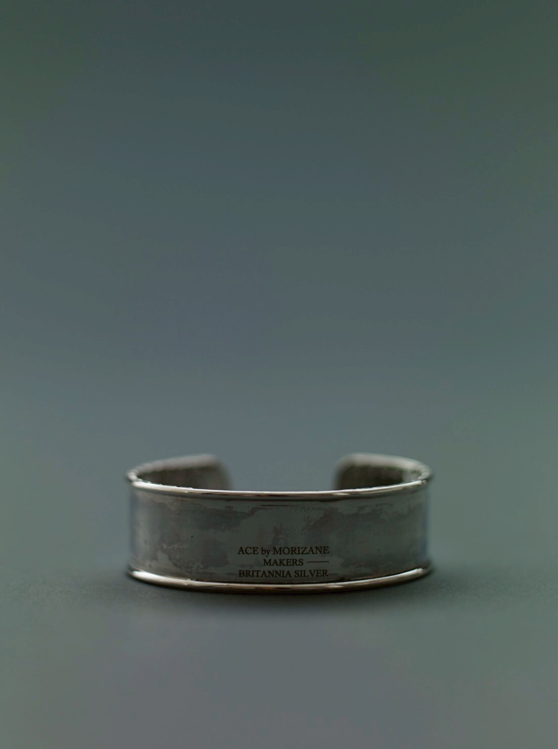 ACE back flip bangle