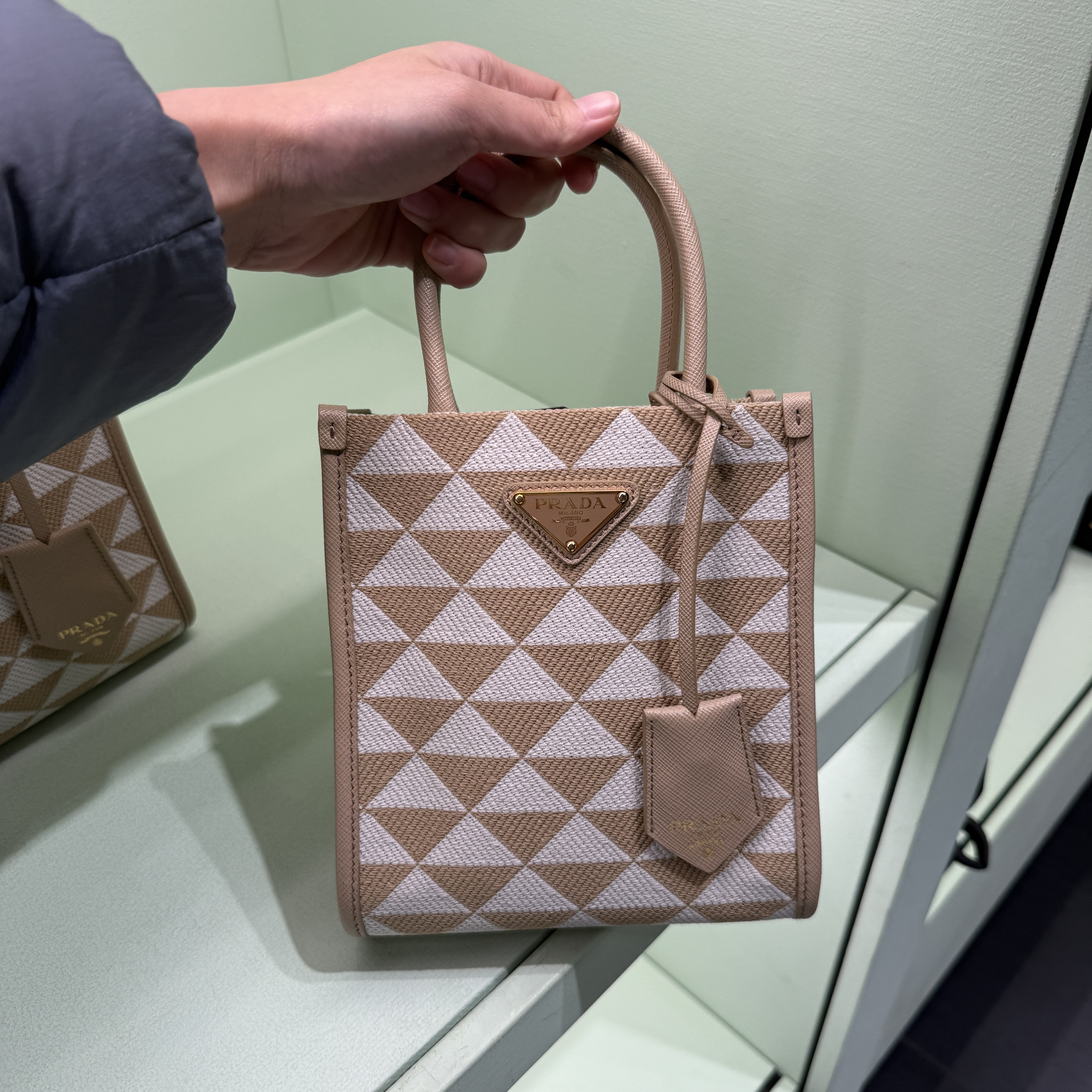 Prada Symbol Embroidered Mini Tote bag Beige 1BA355