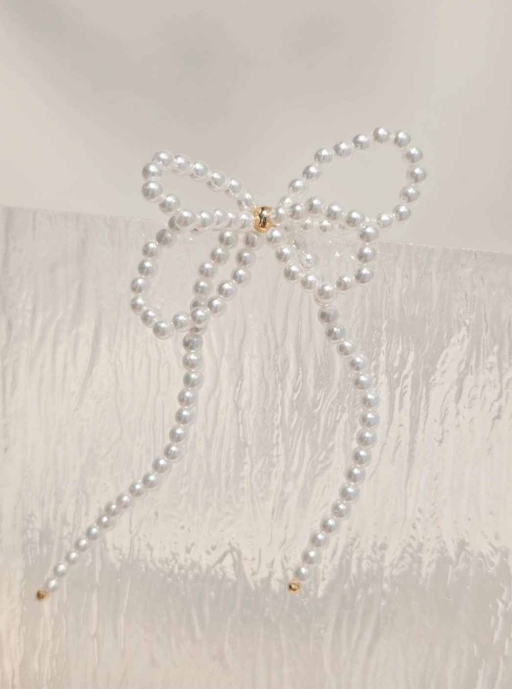 珍珠大蝴蝶結耳環