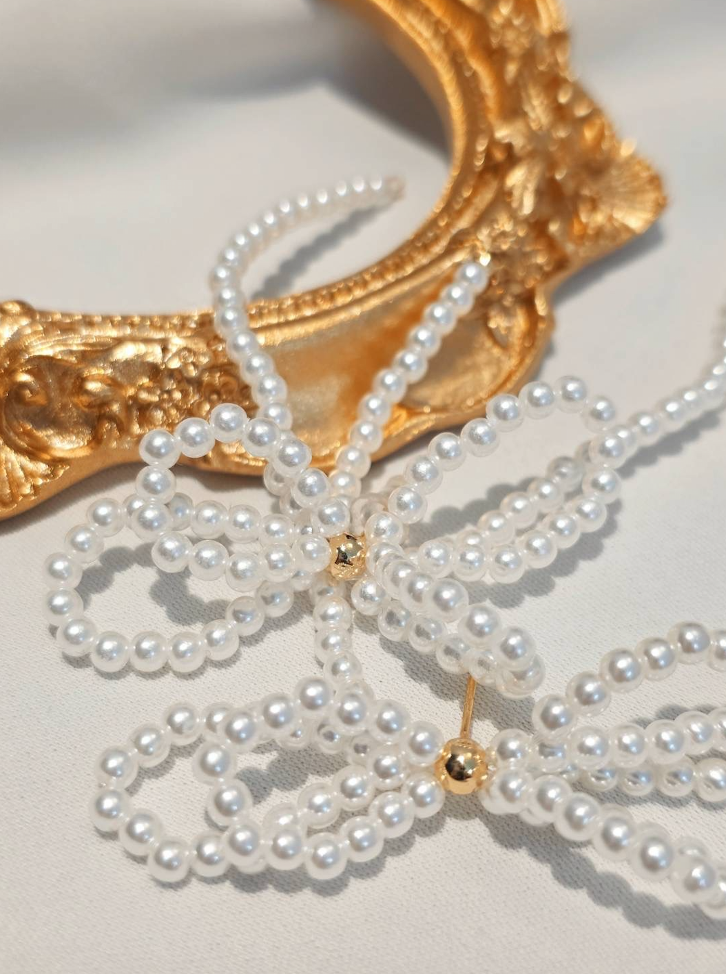 珍珠大蝴蝶結耳環