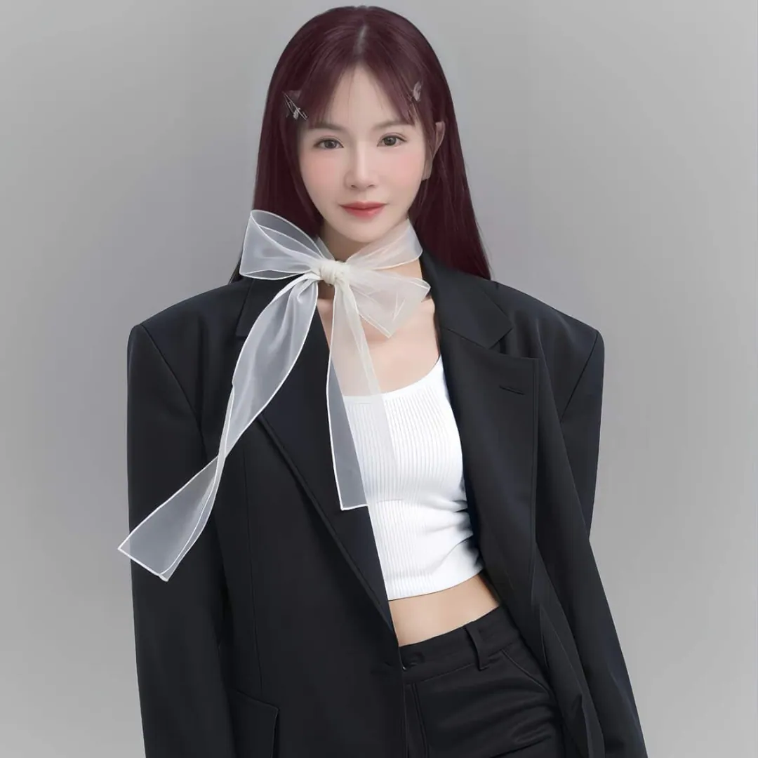 Nini, hairstylist at NC2 Hair Salon