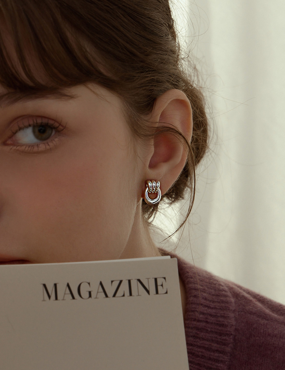 U型圈圈相扣。夾式耳環