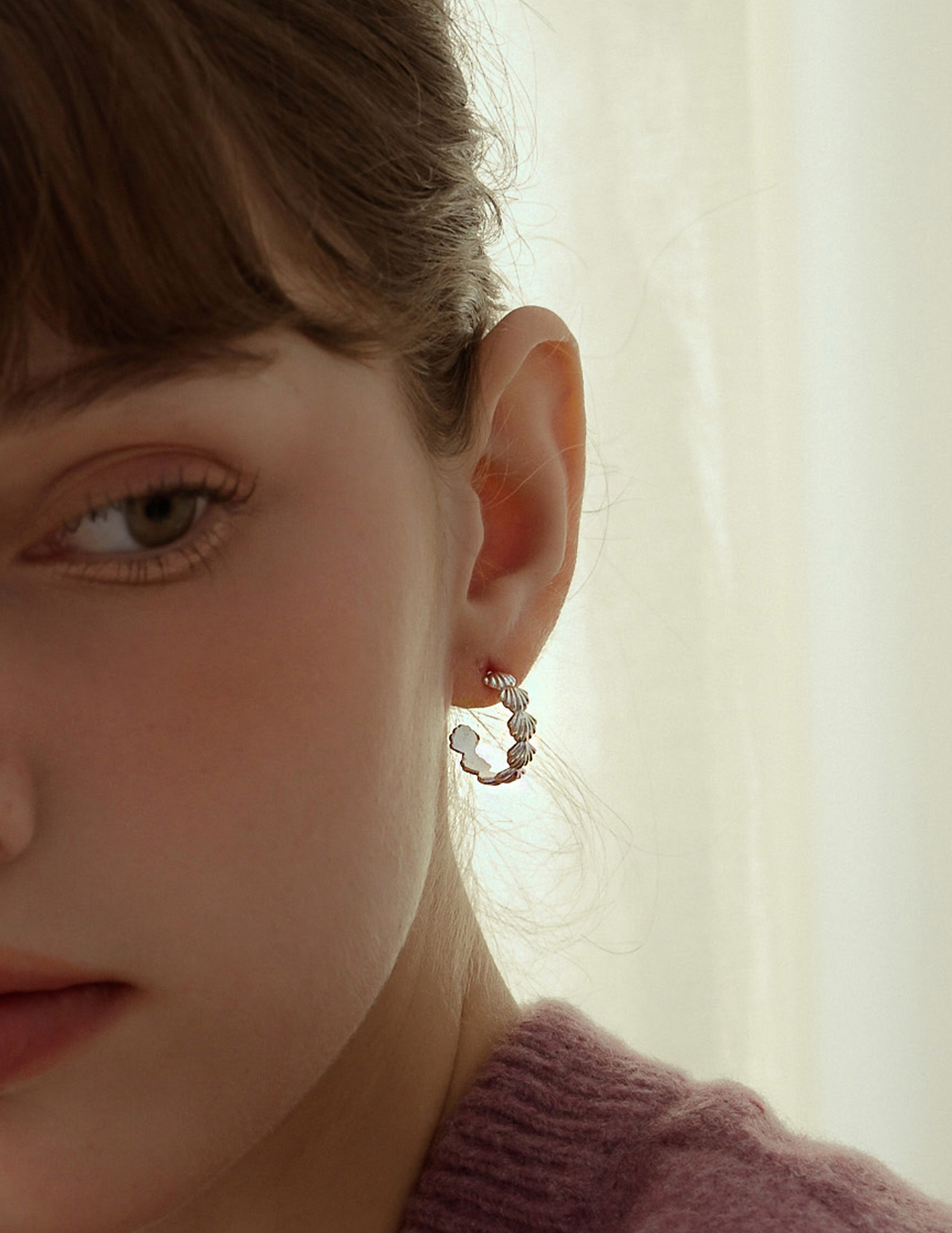 貝殼排列。針式耳環