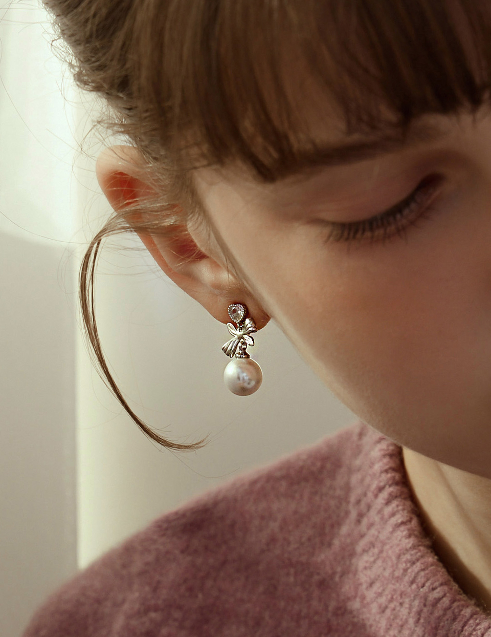 心鑽珍珠蝴蝶結。夾式耳環