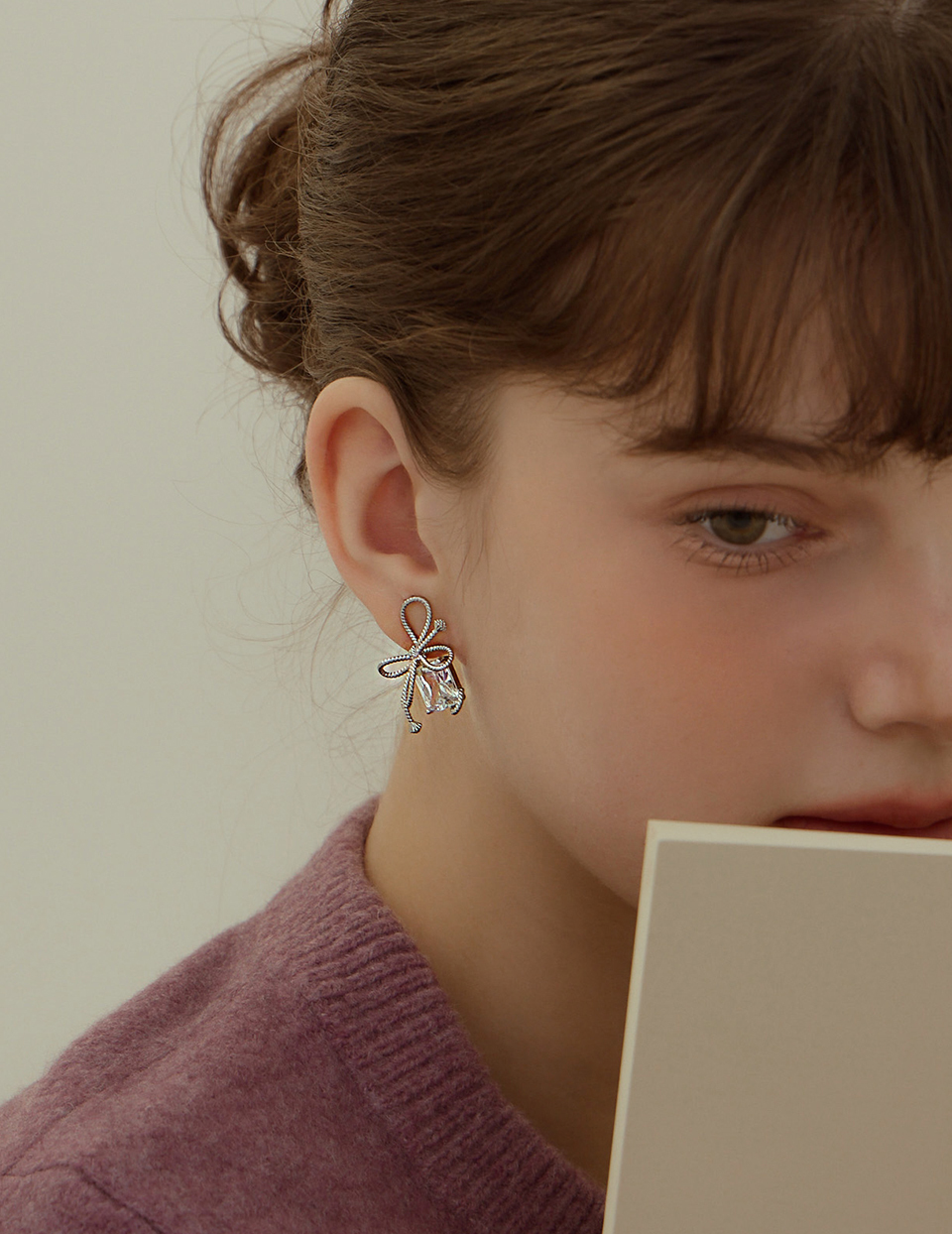 不規則閃耀繩結。夾式耳環(銀)