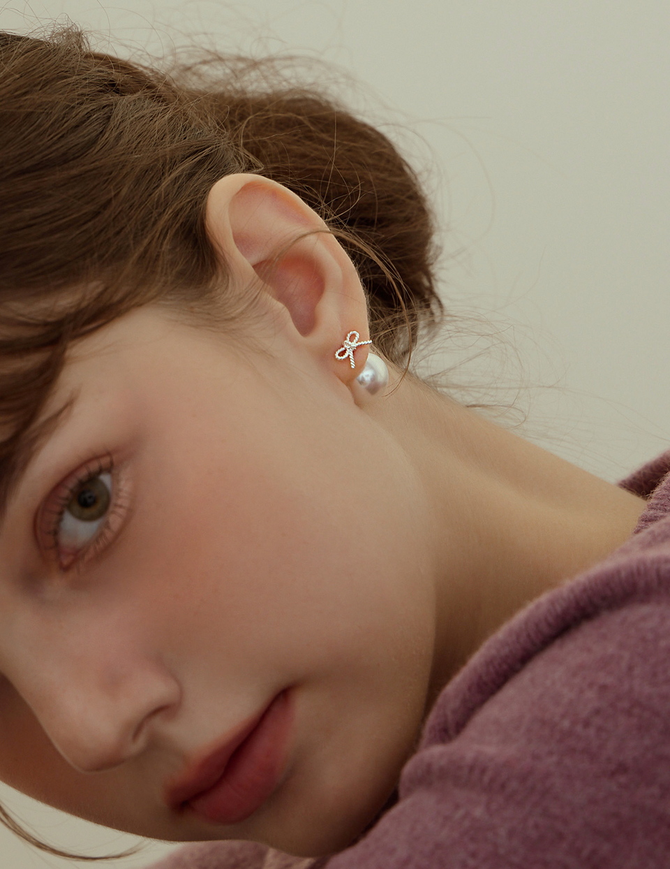 蝴蝶結圓珠兩戴式。針式耳環