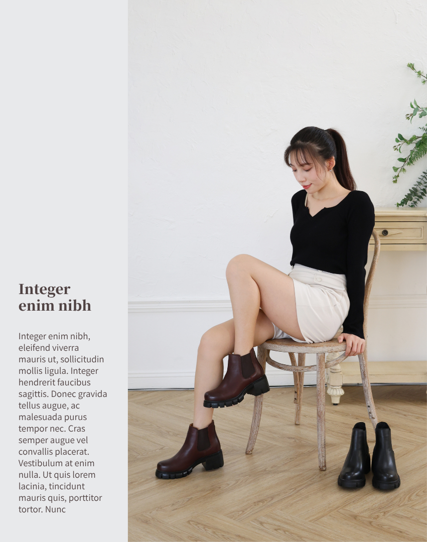 Sanly Joy 切爾西短靴穿搭照，模特示範巧克力咖色靴款，搭配黑色上衣與米色短褲，展現自然優雅的秋冬日常穿搭風格。