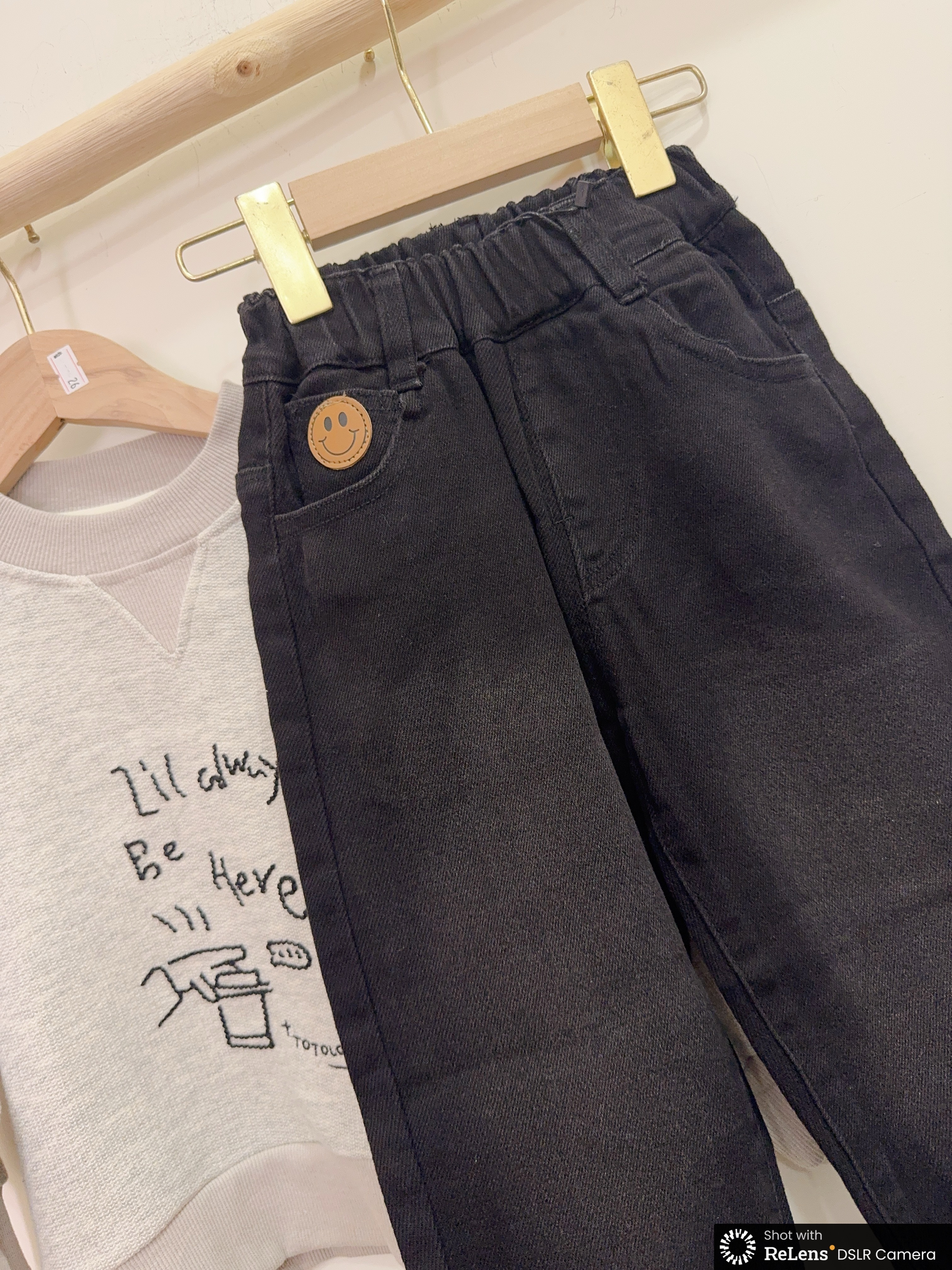 2556微笑黑色牛仔褲e01