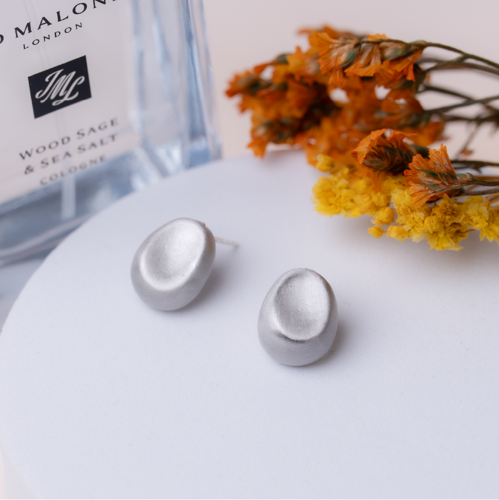 Bean-shaped sterling silver earrings