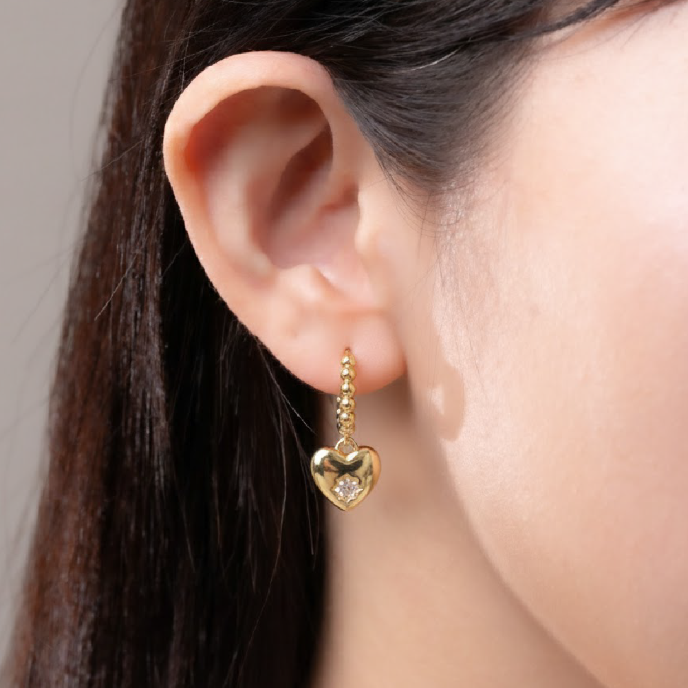 Heart-shaped diamond hoop earrings
