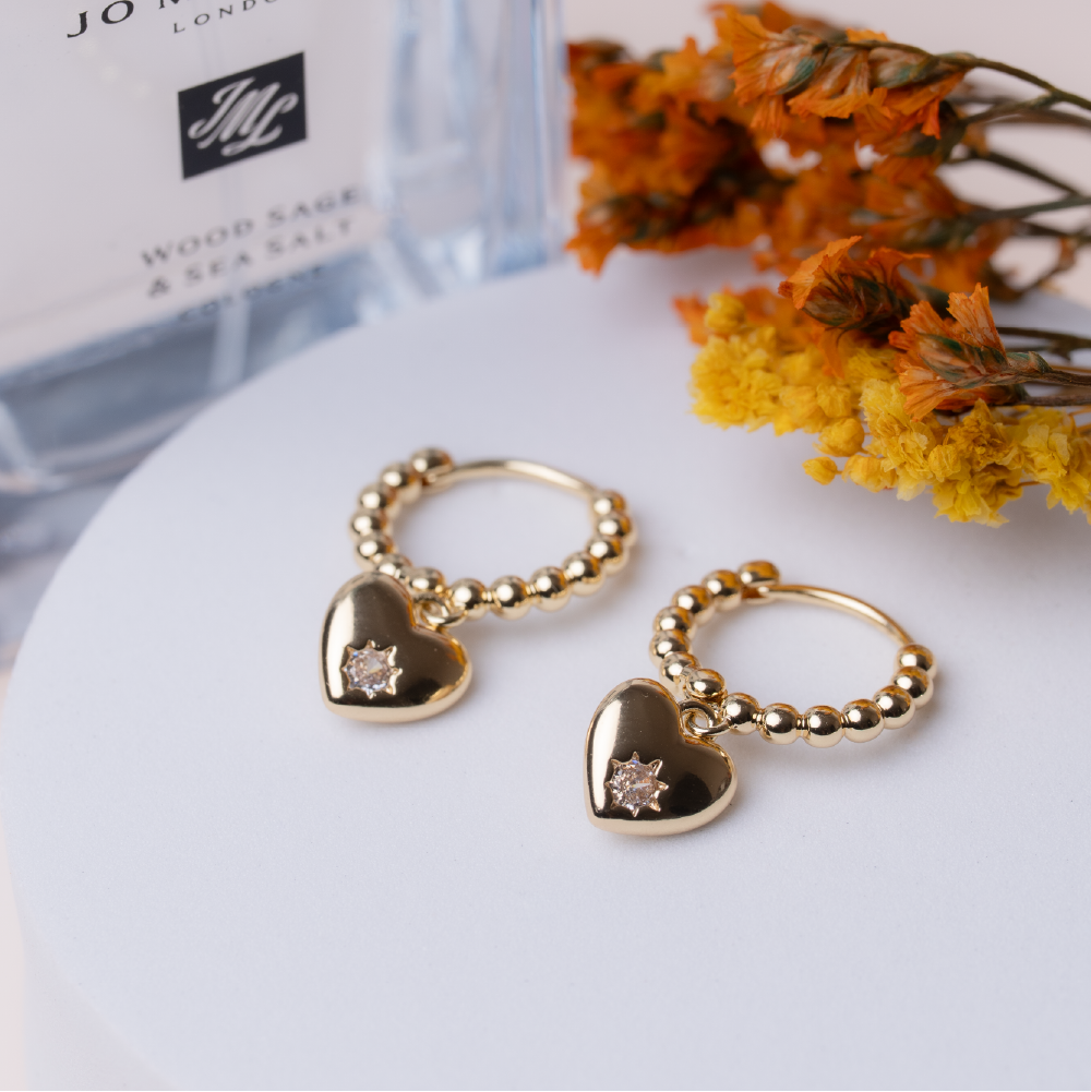 Heart-shaped diamond hoop earrings