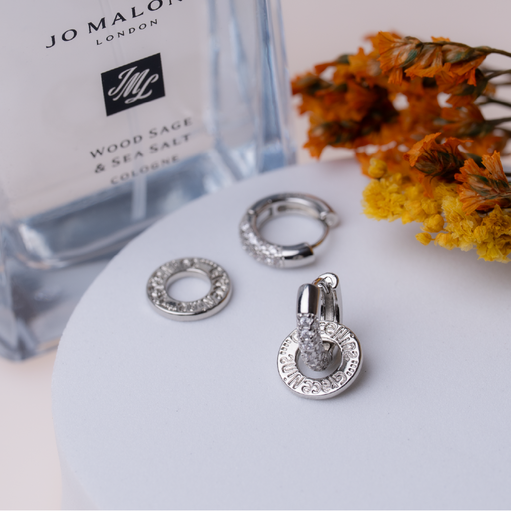 Double-ring diamond-encrusted sterling silver earrings