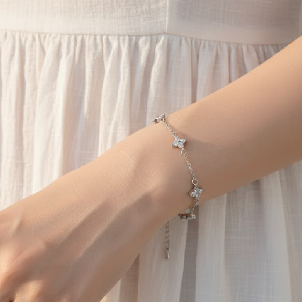 Four-leaf clover diamond-encrusted sterling silver bracelet