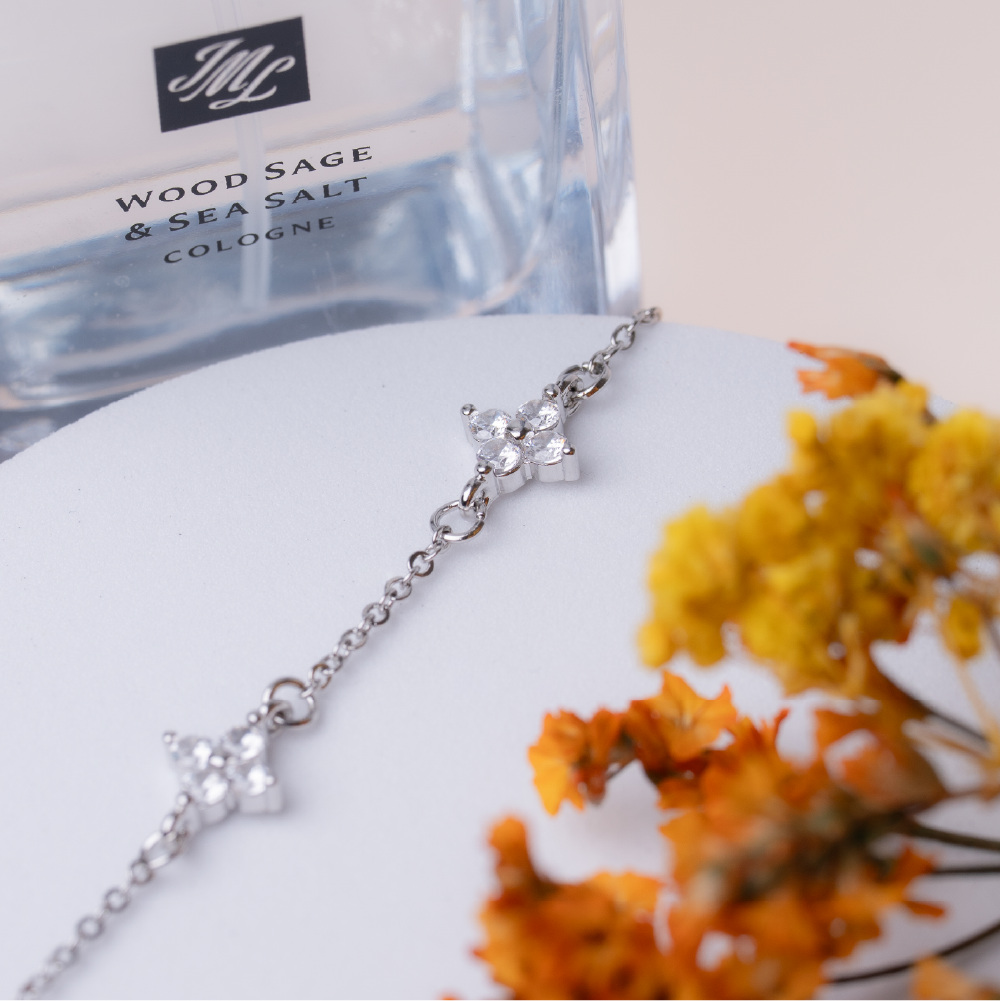 Four-leaf clover diamond-encrusted sterling silver bracelet