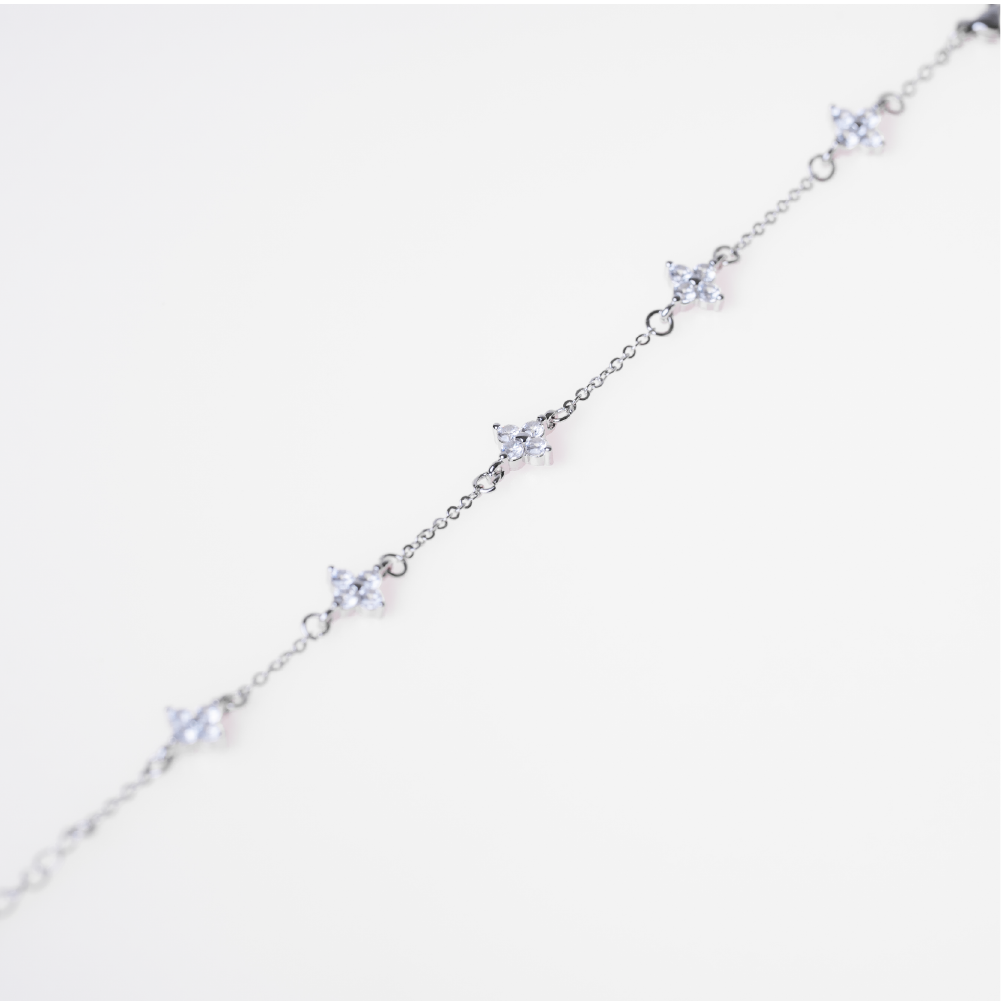 Four-leaf clover diamond-encrusted sterling silver bracelet