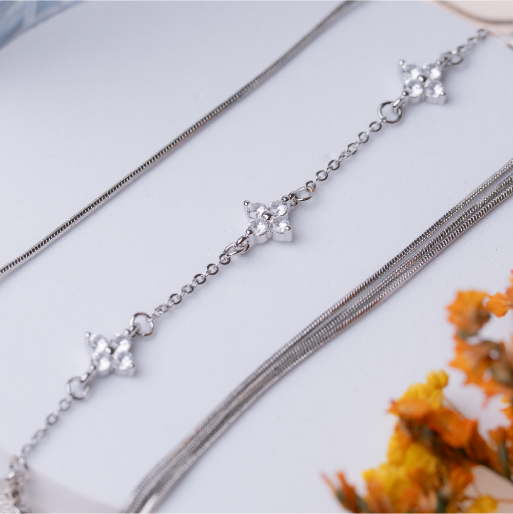 Four-leaf clover diamond-encrusted sterling silver bracelet