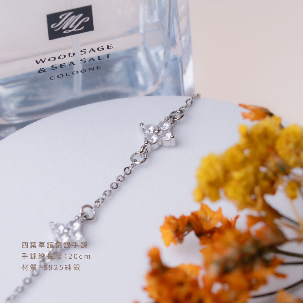 Four-leaf clover diamond-encrusted sterling silver bracelet