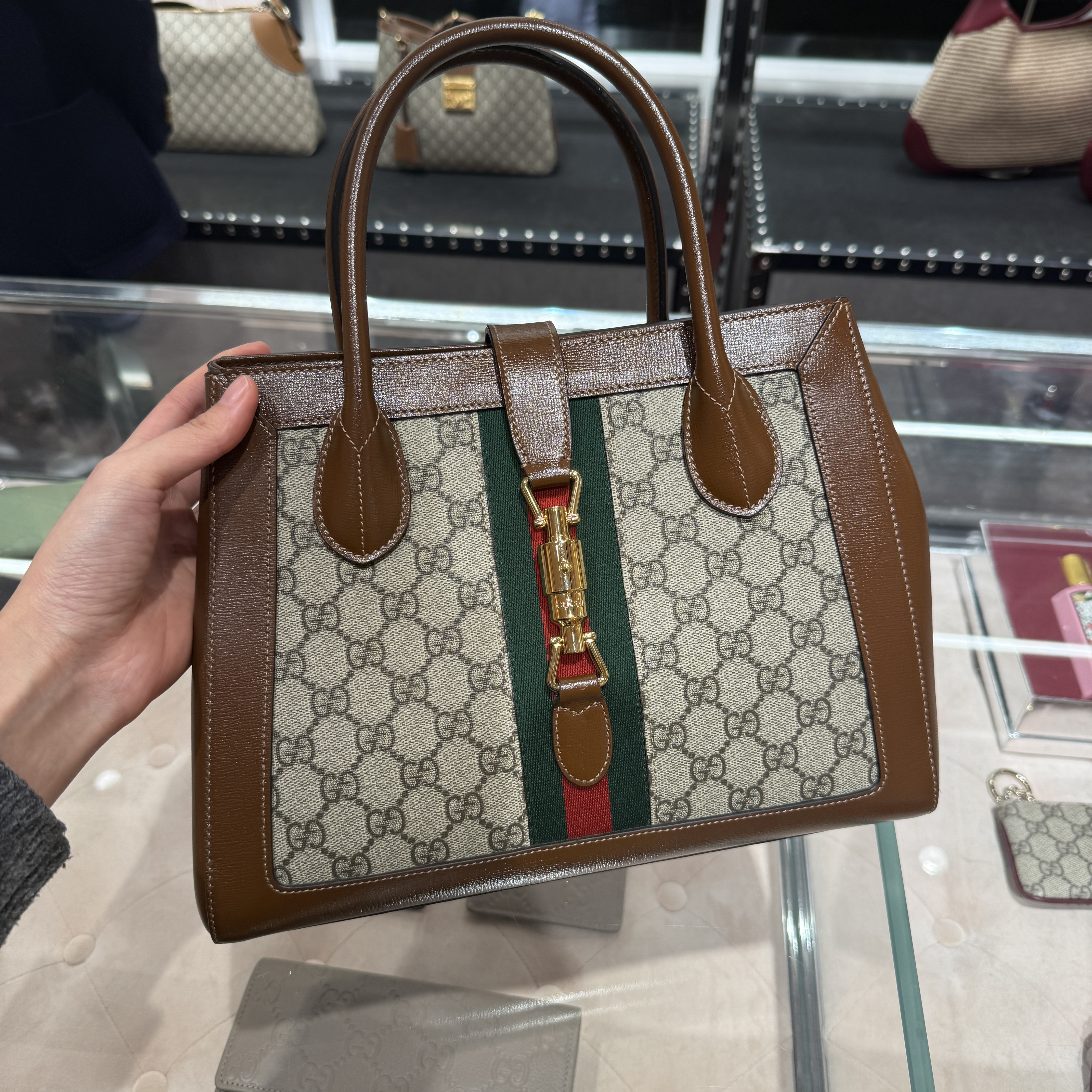 Gucci Bag Medium tote bag with piston closure 649016