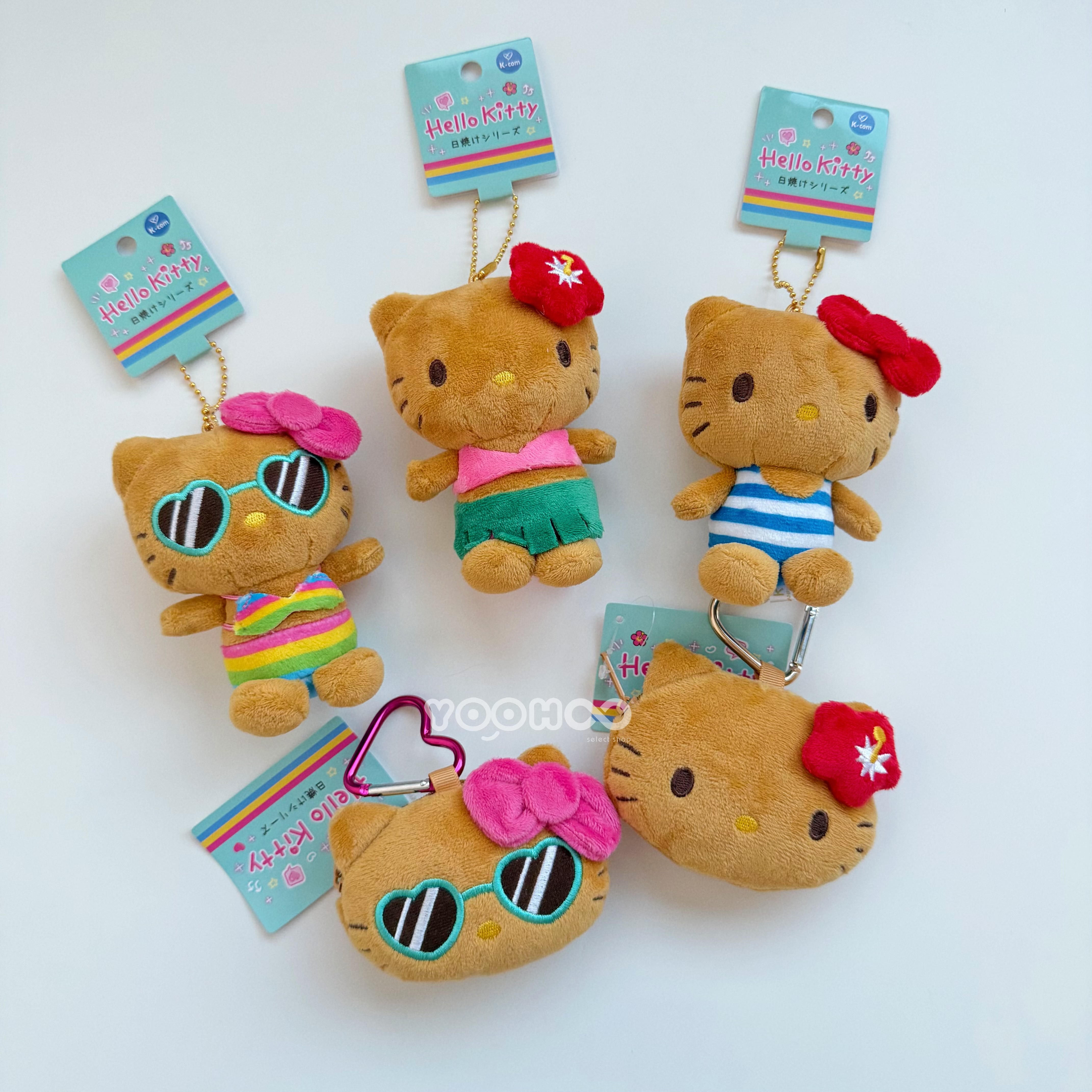 現貨┃日本 三麗鷗 HELLO KITTY 日燒 烤焦 曬黑 扶桑花 草裙舞 愛心扣 零錢包 吊飾