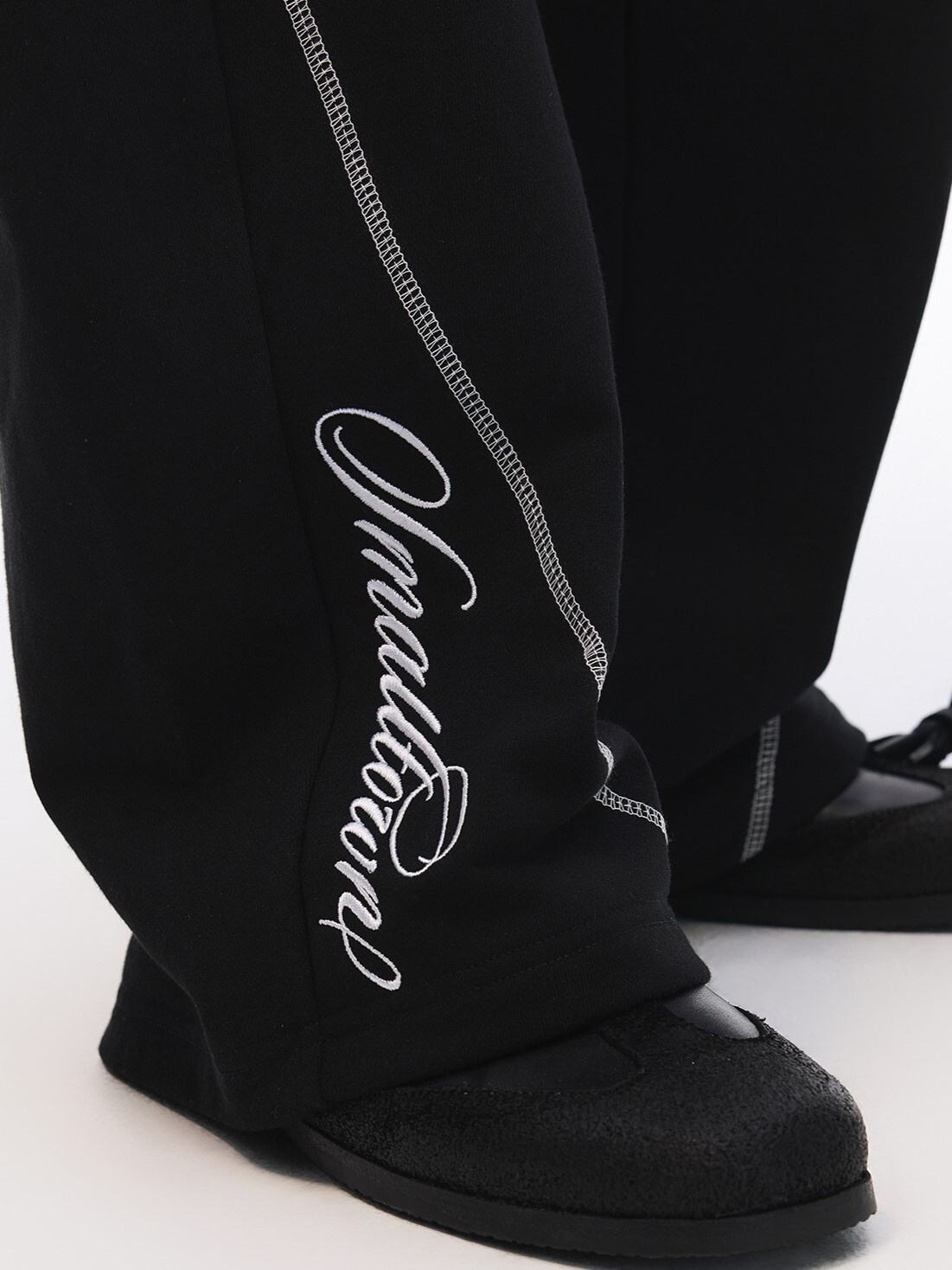 STK SmallTownKid 字母刺繡 明線分割 運動套裝 針織長褲