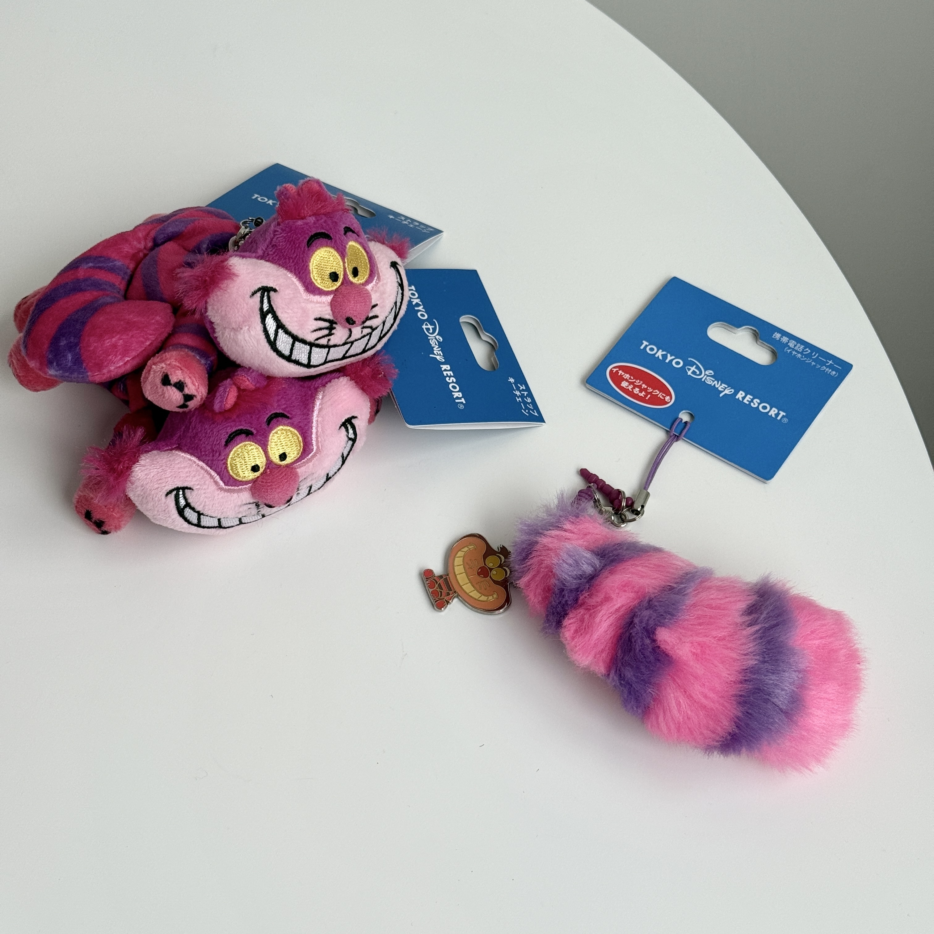 現貨┃日本 東京迪士尼 愛麗絲夢遊仙境 妙妙貓 柴郡貓 尾巴 手機 吊飾