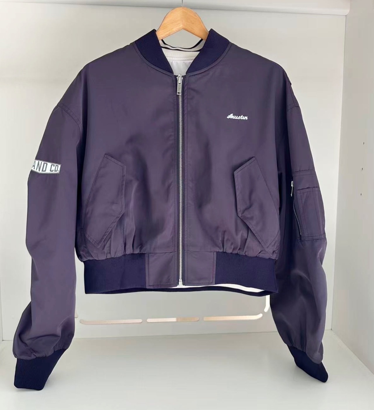 EMBROIDERED WORDING BACK WINDBREAKER