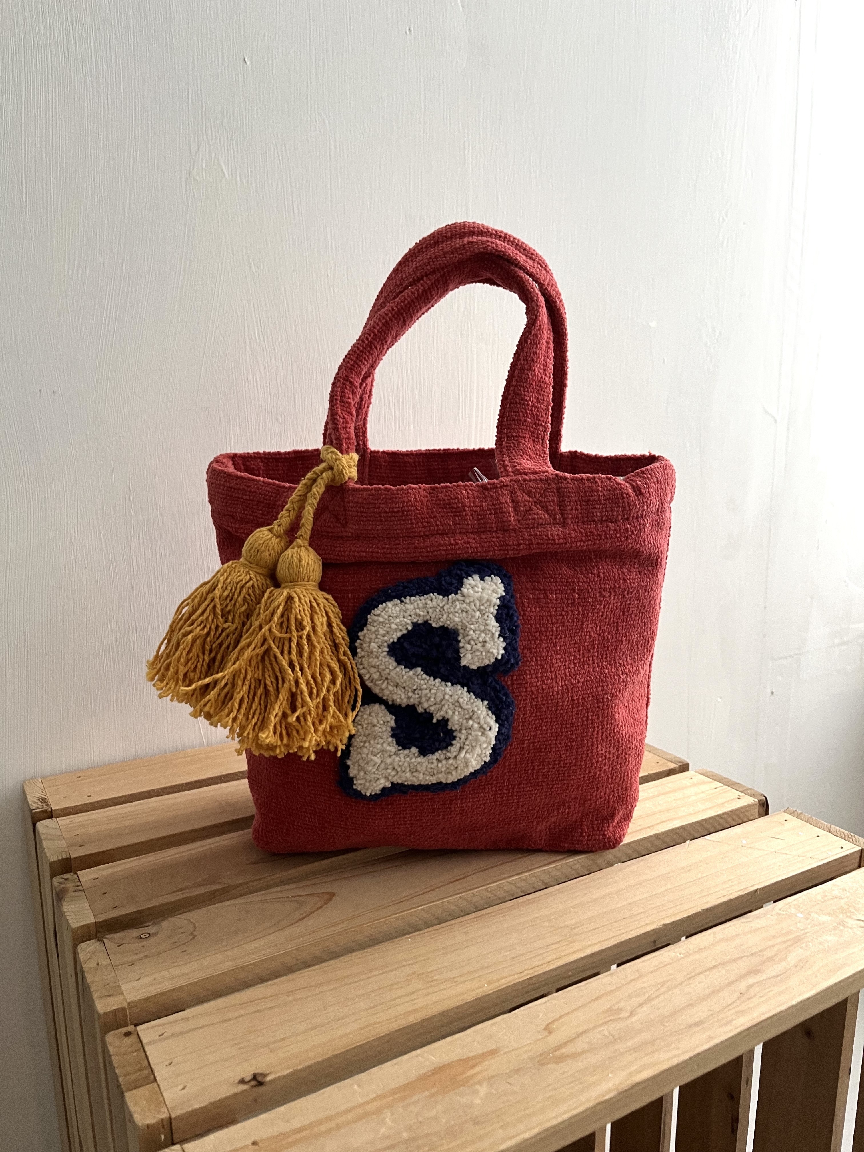 橙红色立體字手挽袋