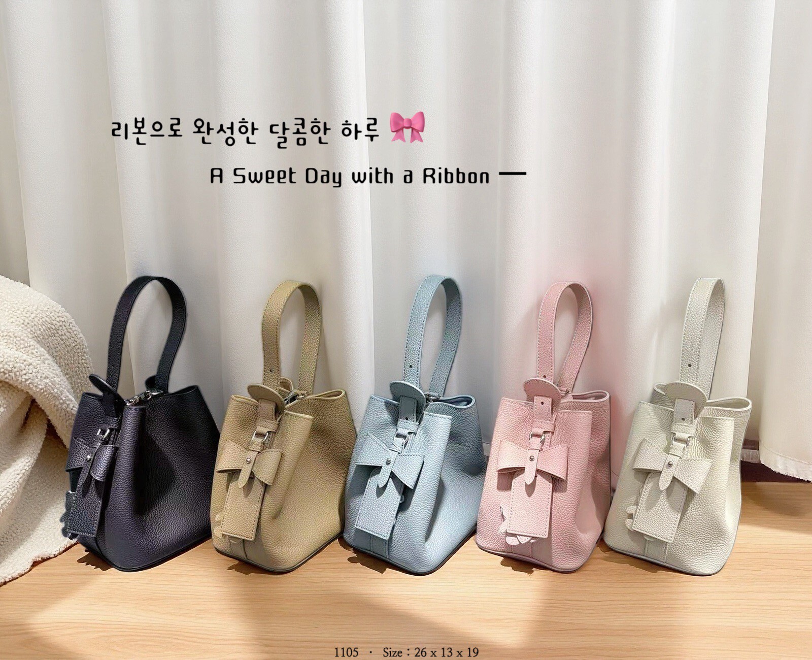 1105韓國牛皮蝴蝶結手提水桶包