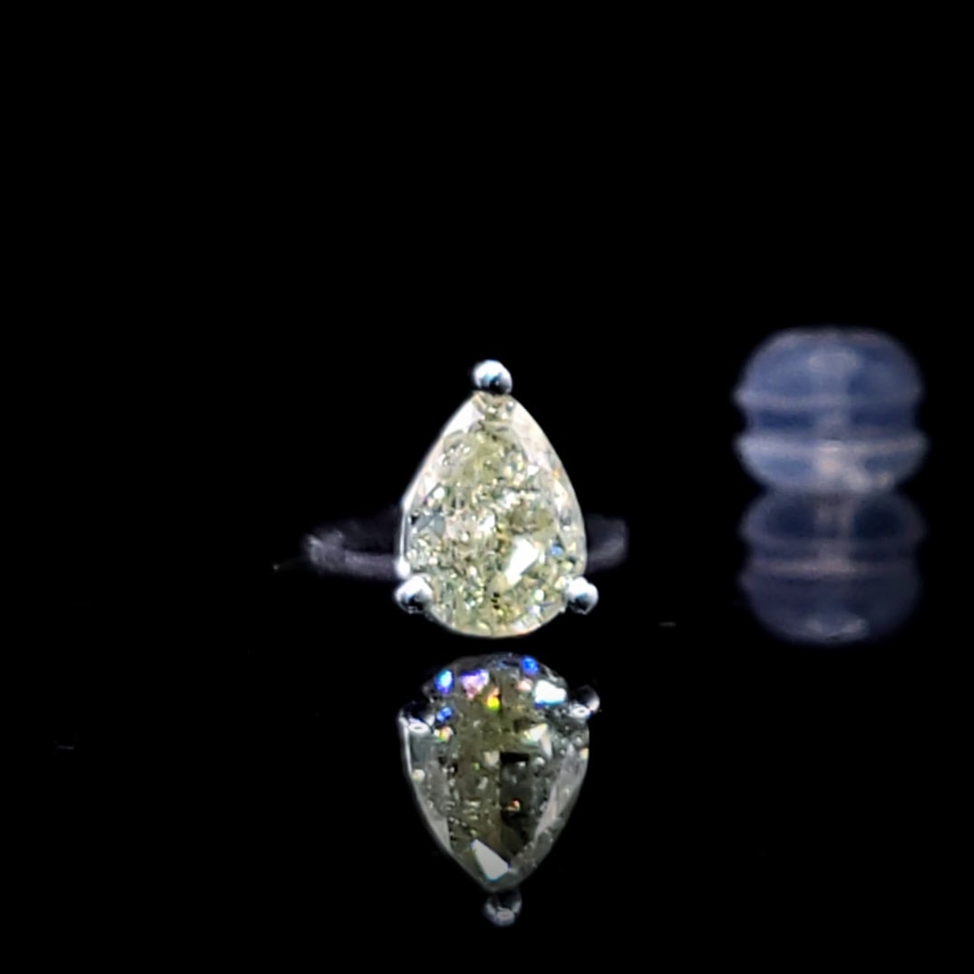 全新18K白金【主石60份梨形彩黃鑽】單耳環