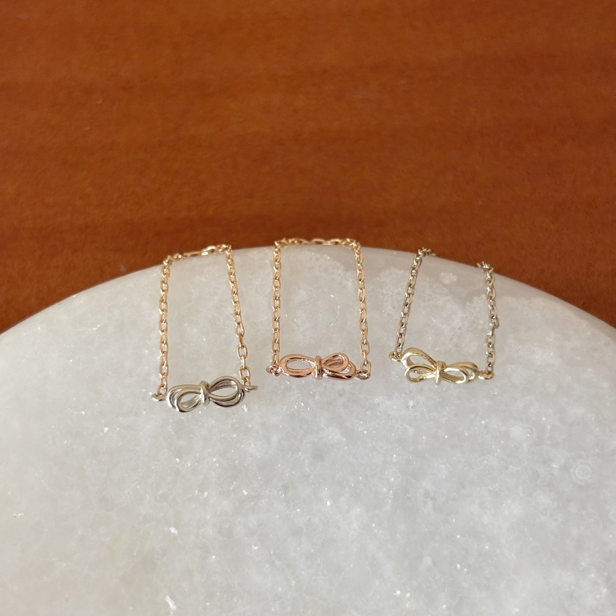 14K線條蝴蝶結鏈戒