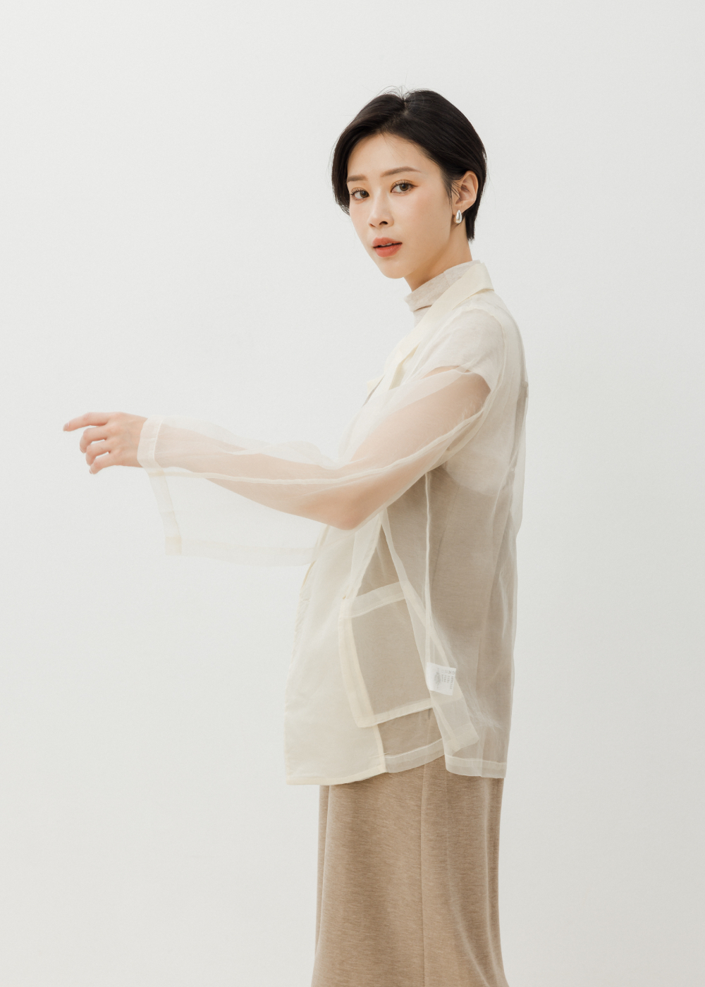 飛袖設計透膚西裝外套