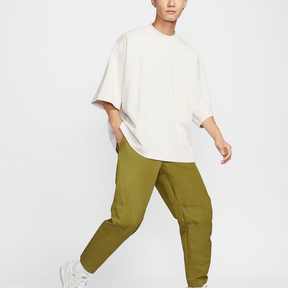 Nike Tech Woven寬版防潑水縮口褲-FZ0711307