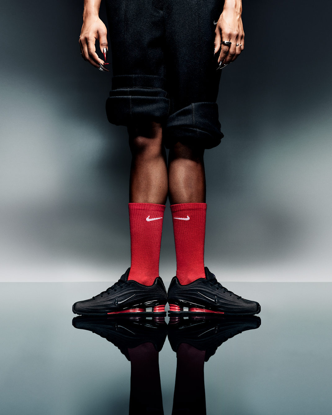 needles butterfly logo