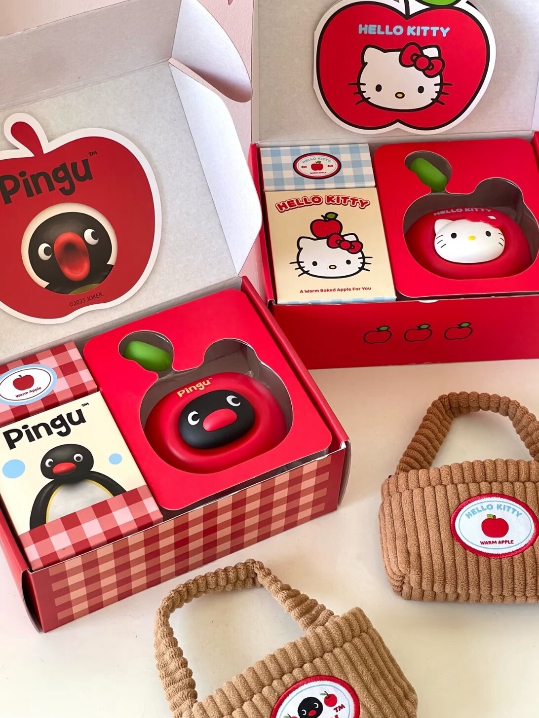 Officially licensed Apple Kitty/Pingu hand warmer