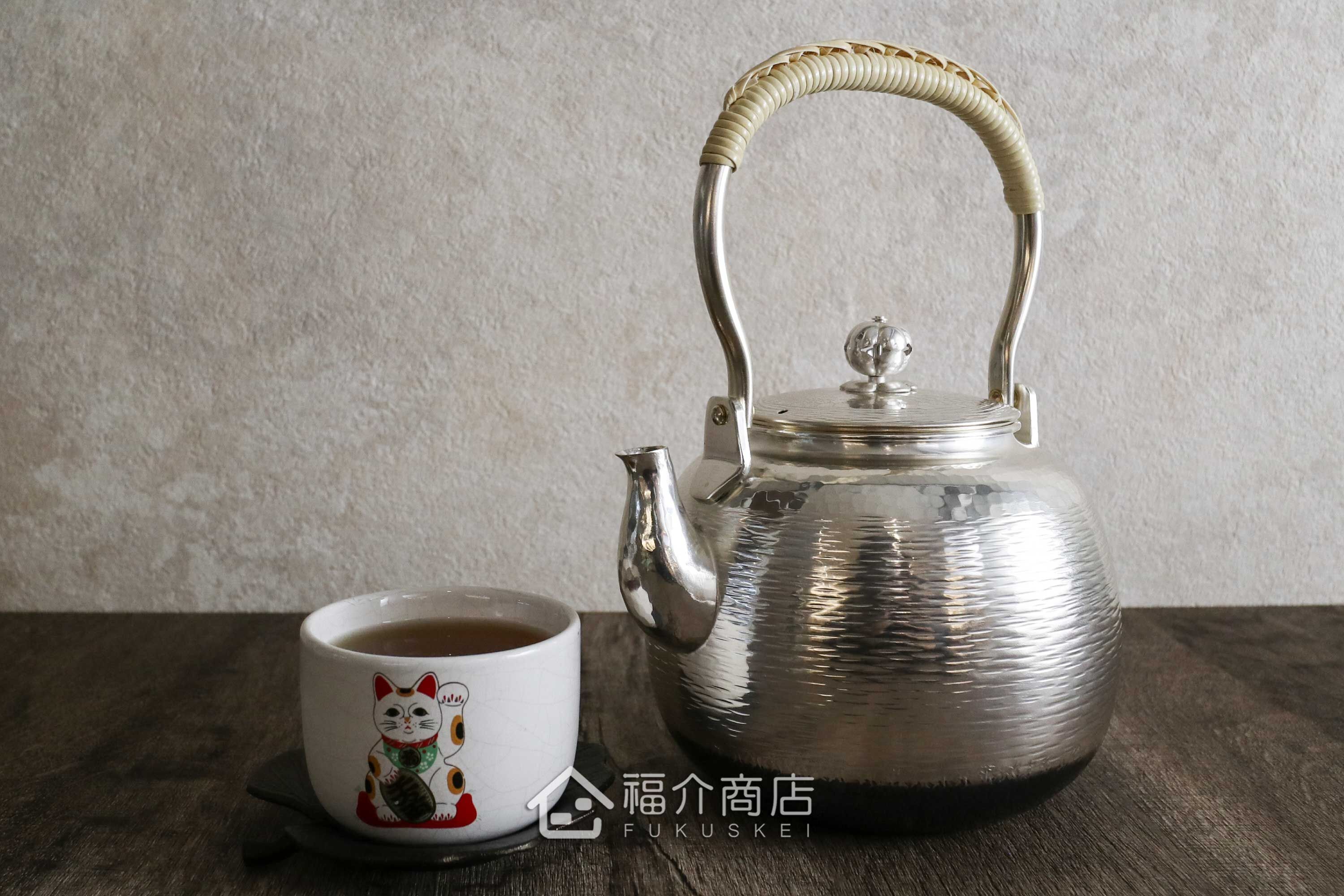 竹籐編織造型手把的日本製銅壺表面鍍銀