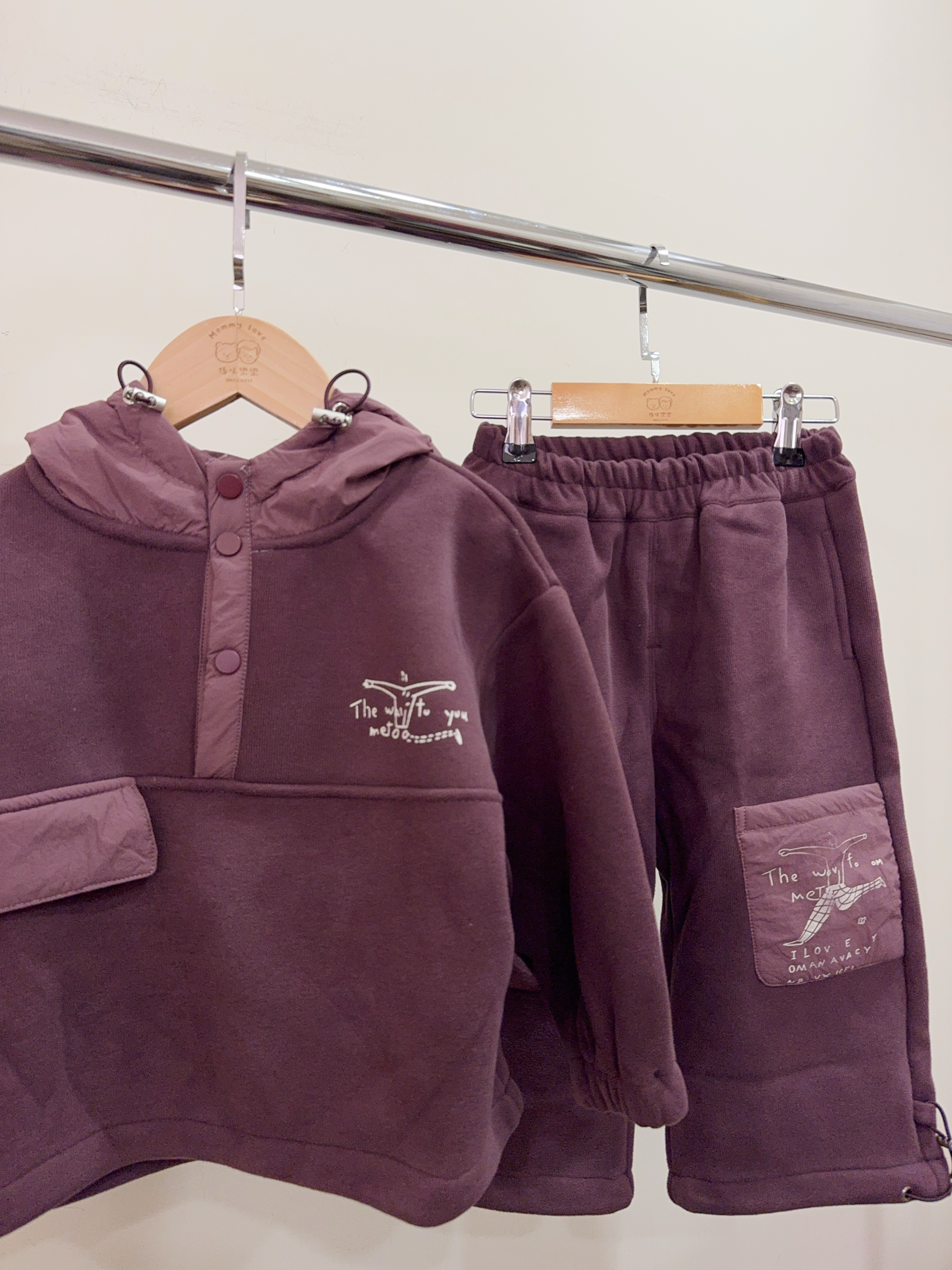 23182紫色異材質接拼連帽套裝