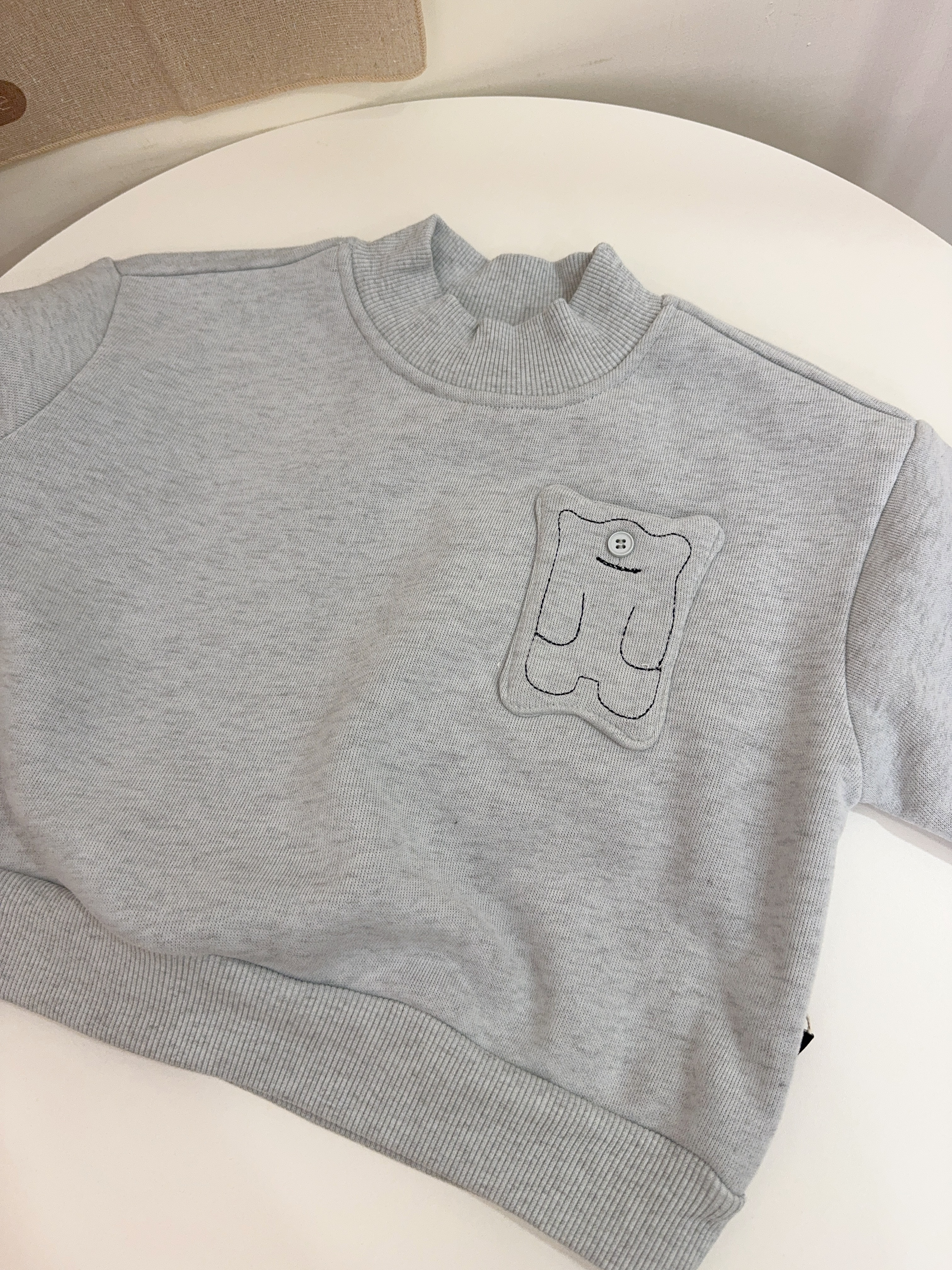 NH6909霧灰藍小怪獸上衣-內薄刷絨