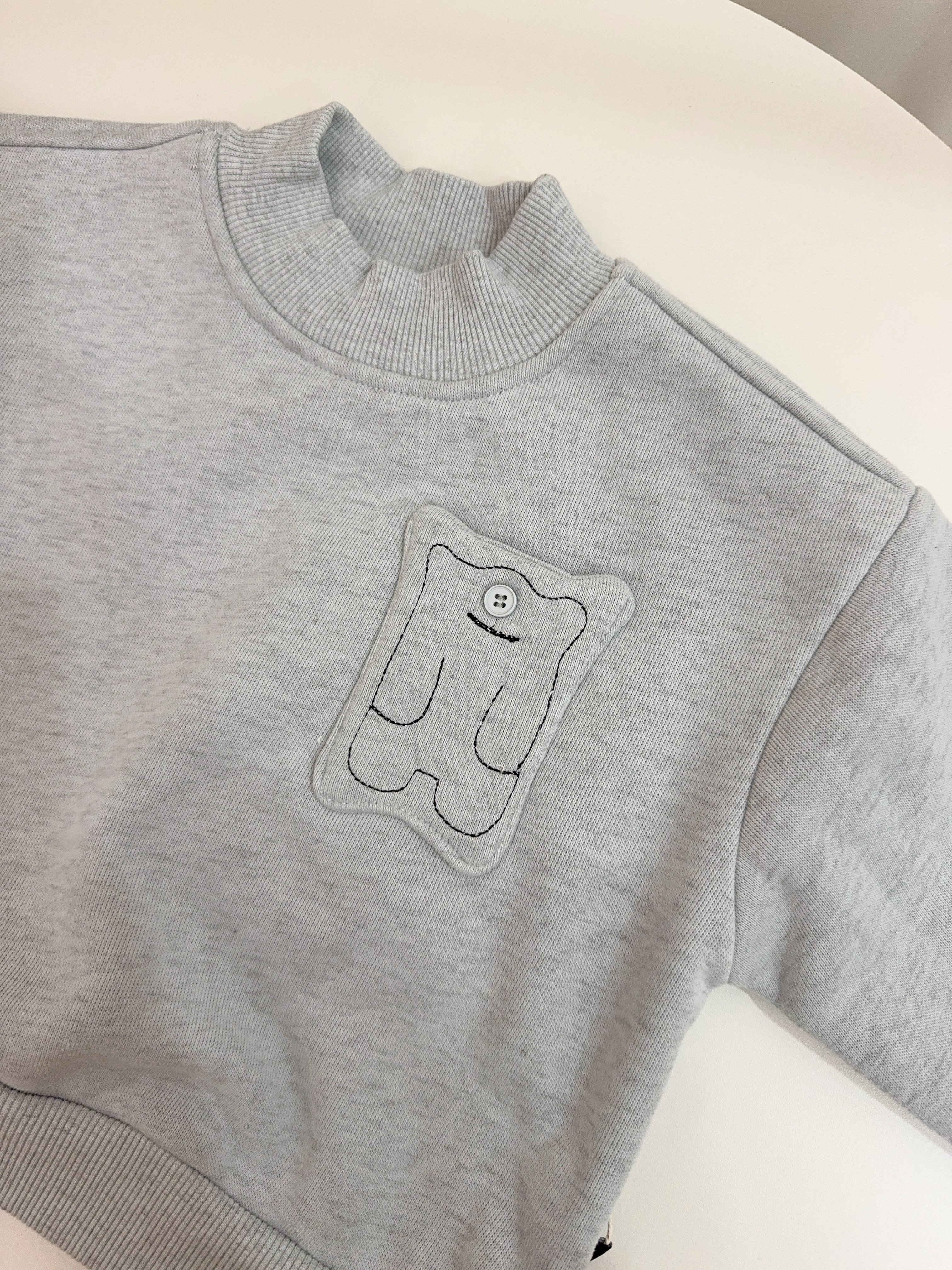 NH6909霧灰藍小怪獸上衣-內薄刷絨