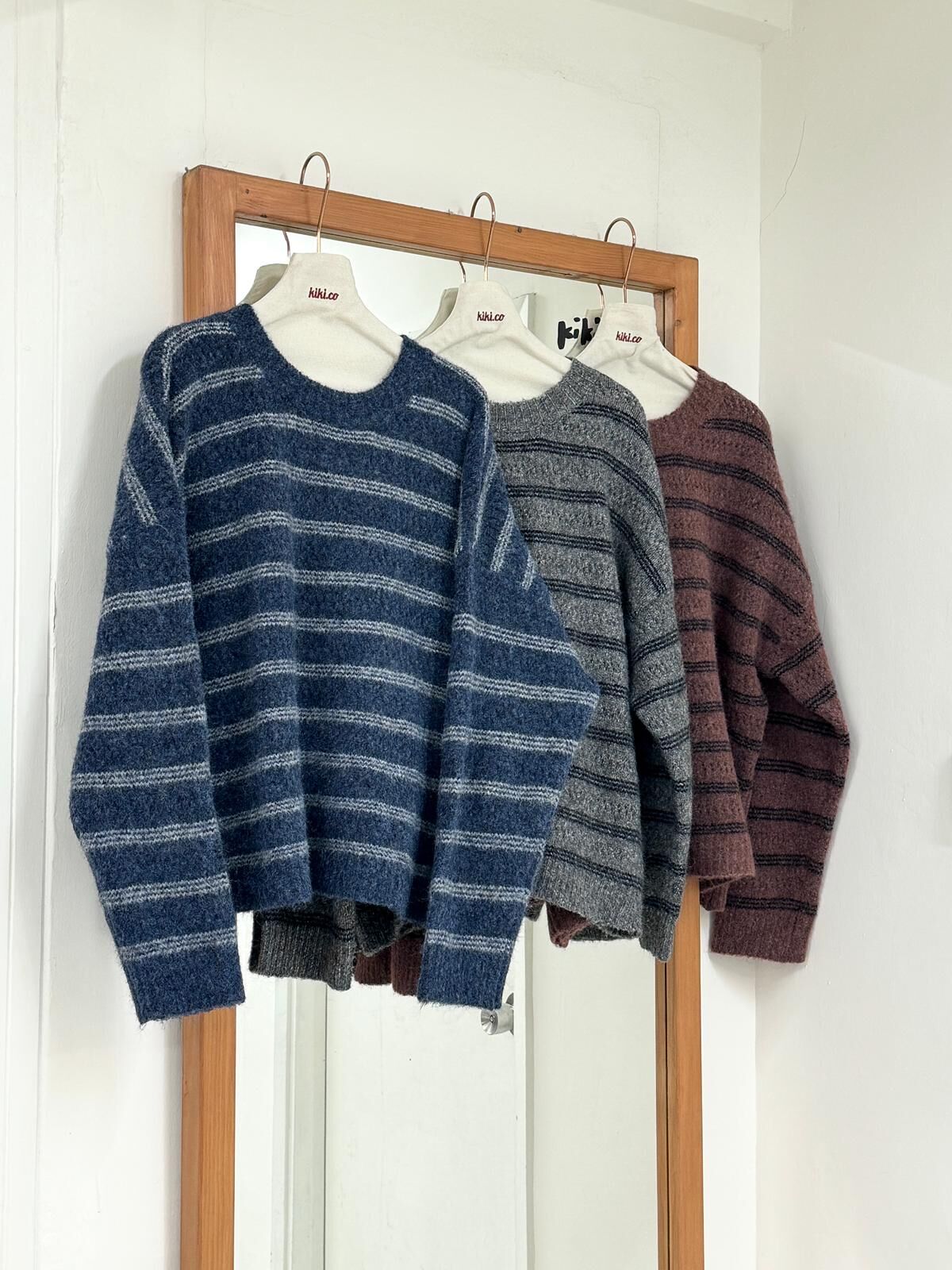 柔軟縷空條紋羊毛毛衣