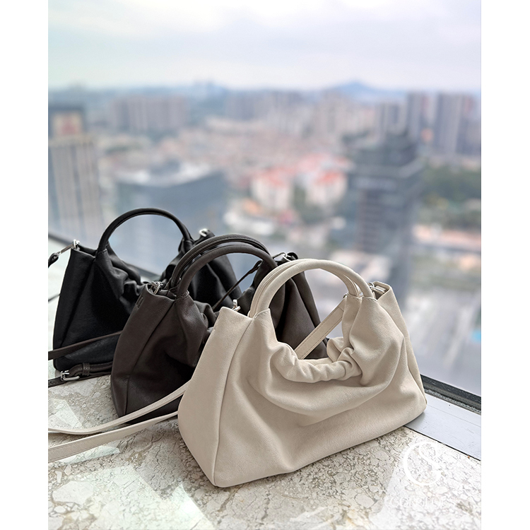 M106「皮革雲朵兩用小巧包」